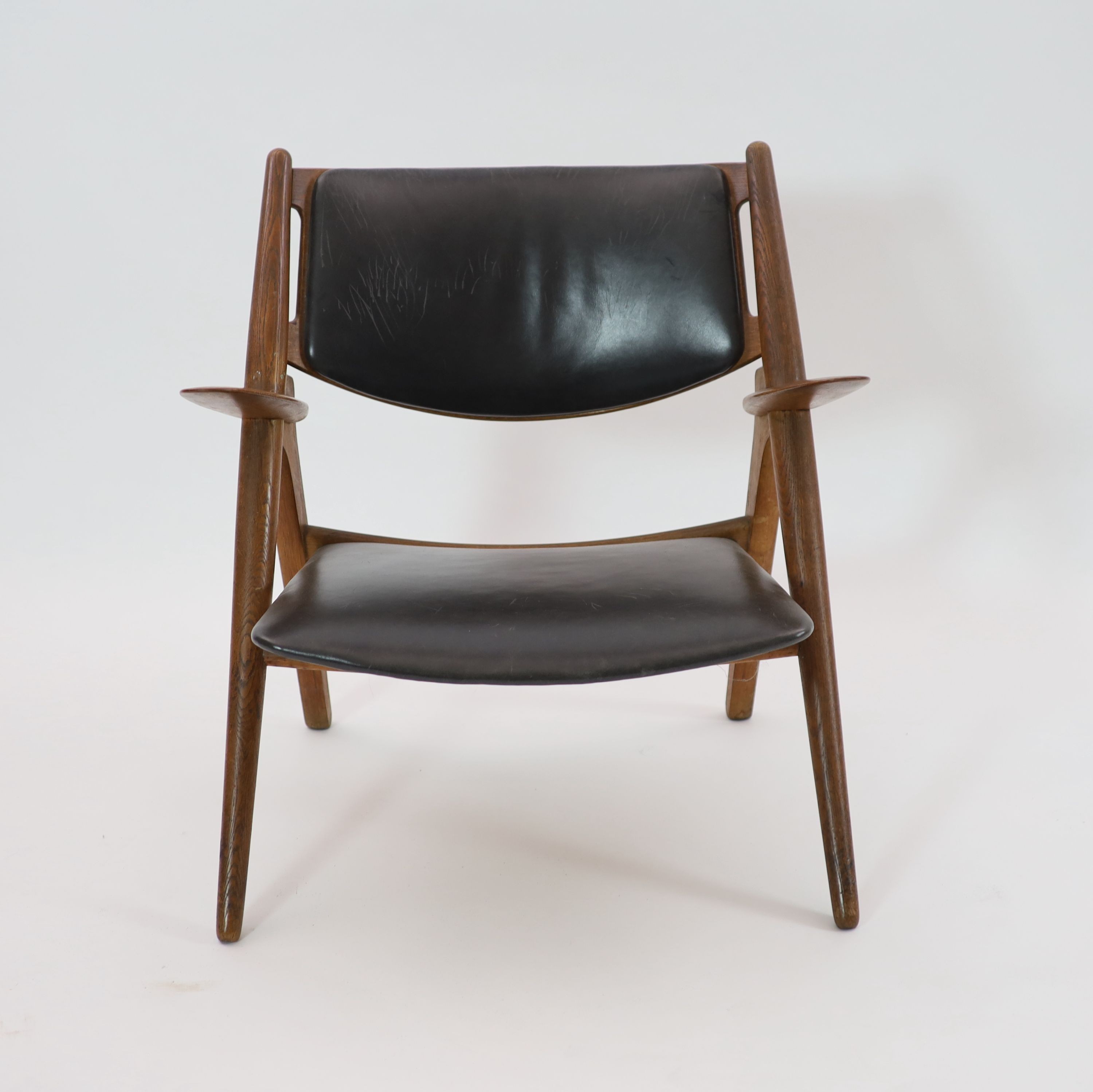 A Hans Wagner for Carl Hansen & Son oak and plywood armchair W.74cm D.64cm. H.77cm.